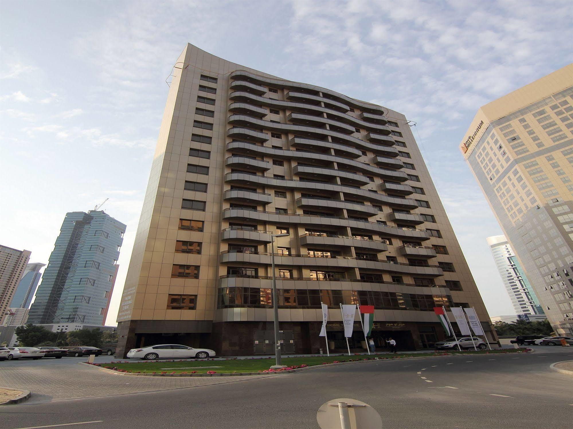 Home To Home Apartments Dubai Esterno foto
