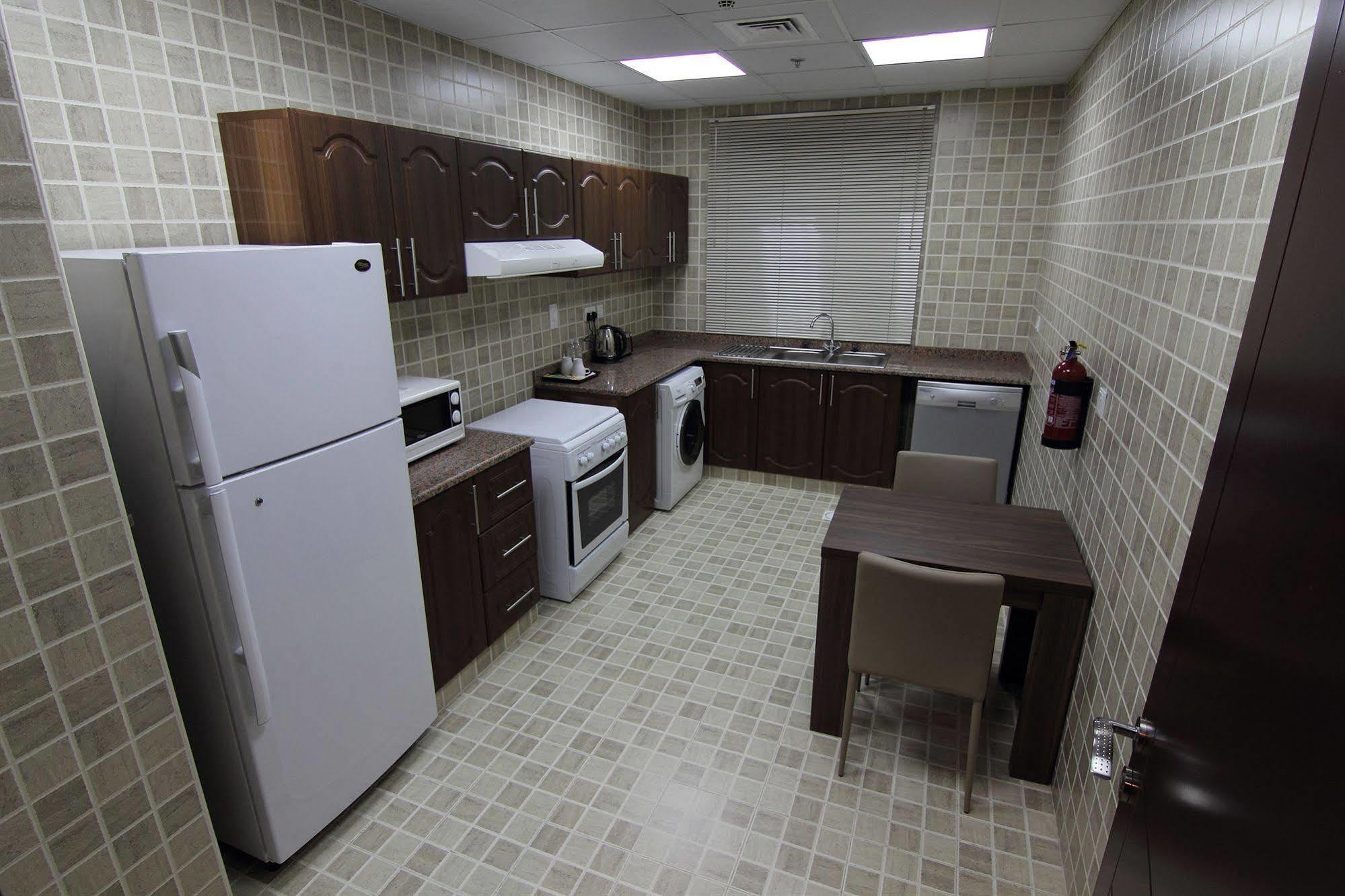 Home To Home Apartments Dubai Esterno foto