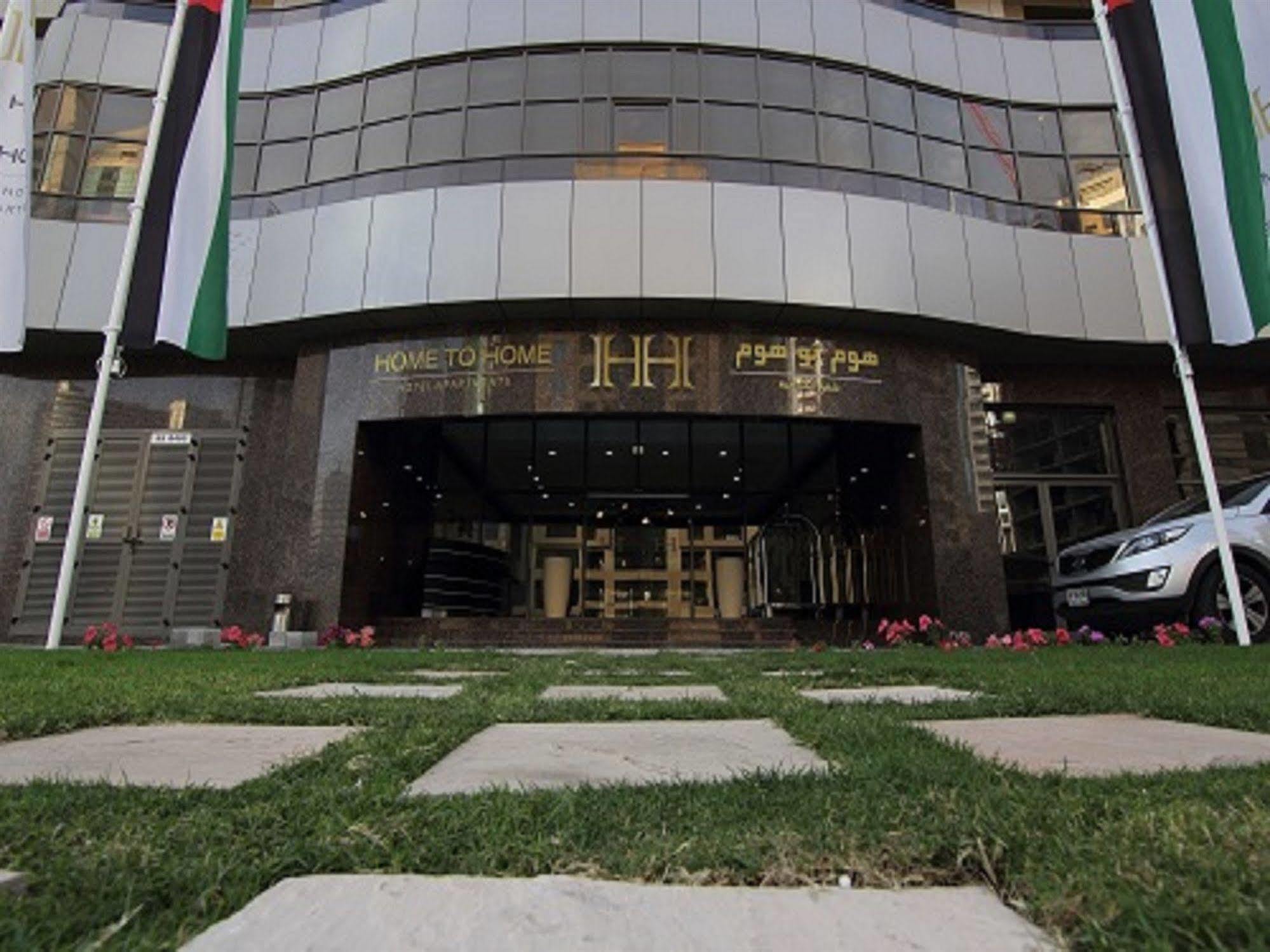 Home To Home Apartments Dubai Esterno foto